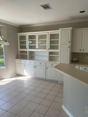 Shelf, cabinet, counter, ceiling and trim painting.