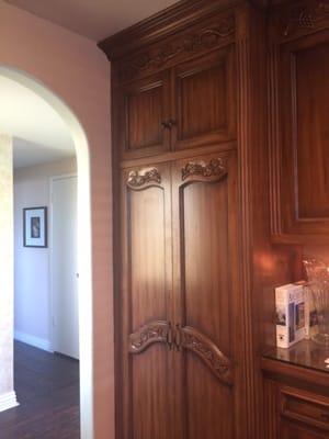 My pantry has hand-carved grape leaves on the doors and goes floor to ceiling making the most of a small space.