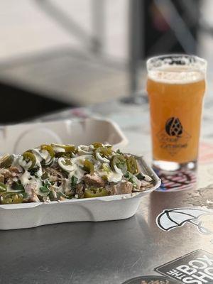 Grilled chicken nachos paired with humble sea double hazy ipa