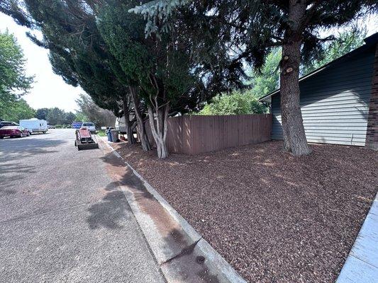 Full front yard and back yard clean up. Install of bark in open areas. House looks amazing!