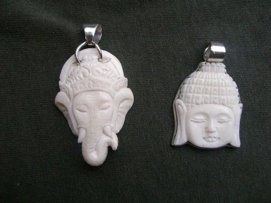 Hand carved pendants of Buddha and Ganesha set in silver, only at Summerwood!