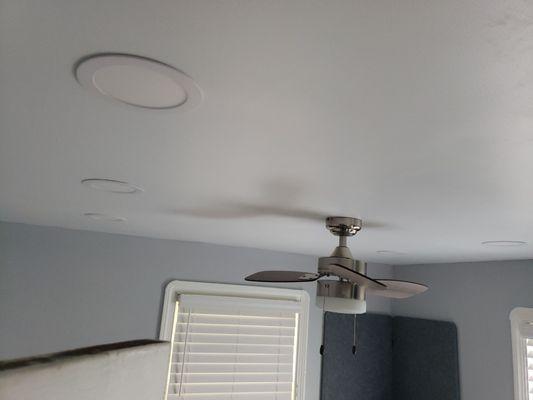 Ceiling damage from leaky roof repaired and better than before