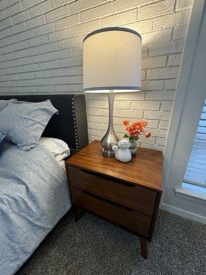 Exposed brick bedroom