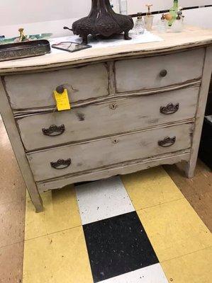 A restored rustic dresser