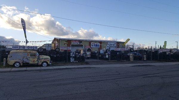 Front of Judd Lees Tires located just behind 509cars Mike's Bar and Grill between Appleway and Sprague on Dale Road