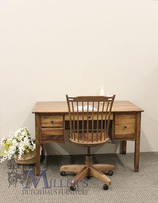 A small writing desk. We have a large in stock selection of writing desks, full size desks, and desk chairs. Available in custom finishes.