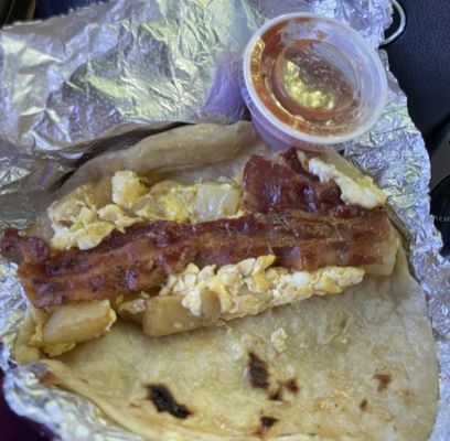 Potato egg and bacon breakfast taco