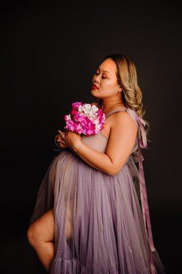 fine art maternity session in the studio, gowns provided