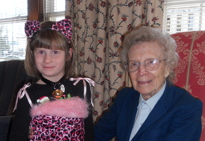 Doolittle Home resident enjoys a Halloween visitor. 