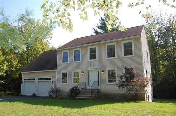 Buxton $304,900 - 3 or 4BR, 2.5bath with room to expand over the garage or in the daylight basement. Private setting on a dead end road.