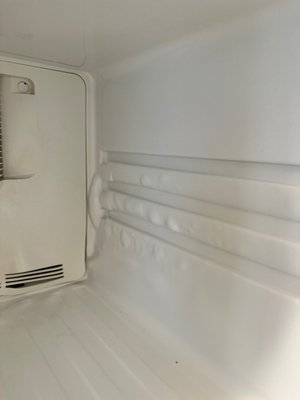 The technician used a blow dryer and the sides of the freezer are now distorted.