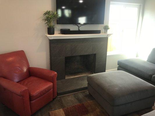 New fire place facing and mantel in complete home remodel