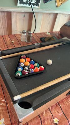 Mini pool game on table