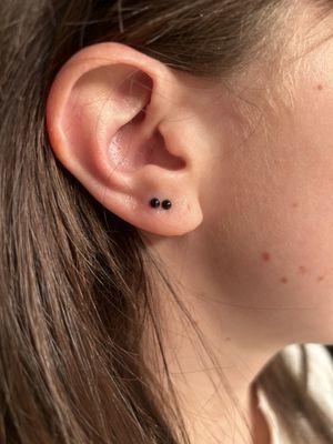 Right ear, piercings clearly places way too close together