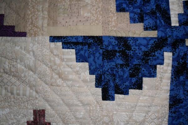 Willow Creek Cafe & Store - "Log Cabin in the Round: quilts on walls inside by owner Bev Vickery