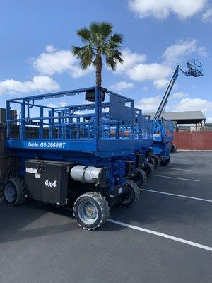 All white tire duel fuel RT scissor lifts.