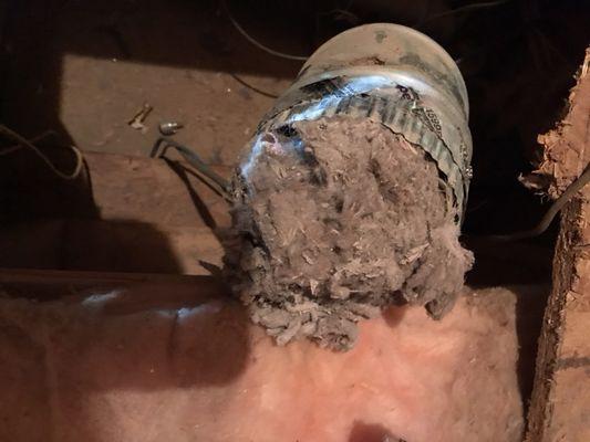 An extremely clogged dryer vent that almost caused a fire