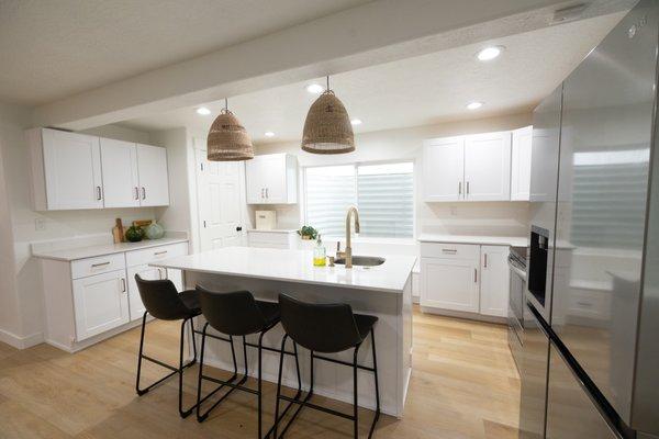 Finished basement kitchen area, great for extra space, hosting guests and parties, or a downstairs rental unit.