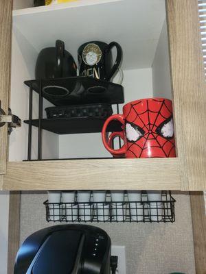 These are some on a budget organization items I use in my own home.  The Kcup holder is a spice rack! Great space saver!