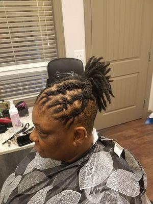 Retwist with style and shaved back. Hiding hair loss