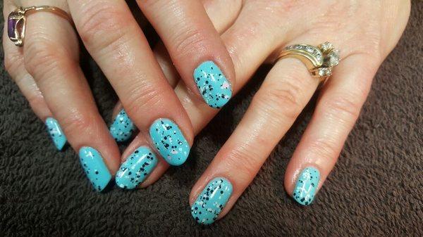 OPI No Chip Manicure with a speckled effect. Two weeks of perfectly polished nails and no chipping.