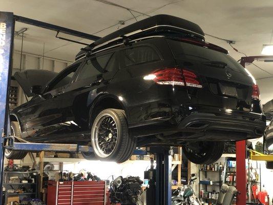 Mercedes wagon on 2 piece rotiforms in for some exhaust upgrades and coilover installation