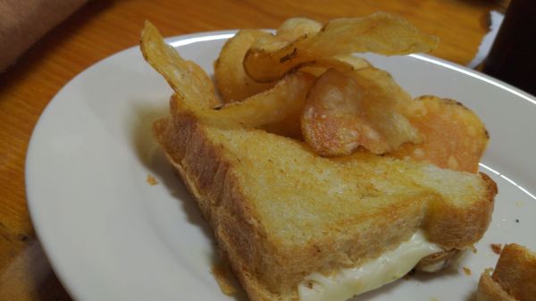 Grilled cheese on homemade butter bread with homemade potato chips.