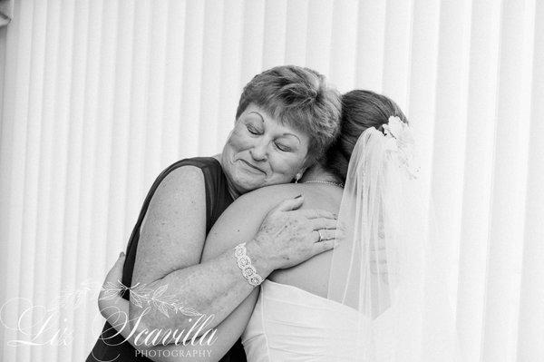 Mother of the bride hugging her daughter - Liz Scavilla Photography