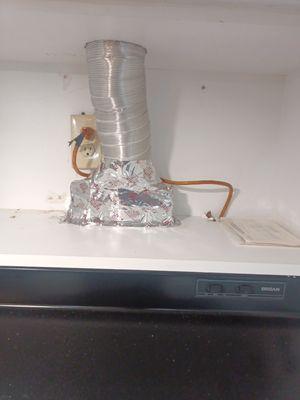 This was just a job I did taping the output of the stove's range fan to the input of the kitchen exhaust line!