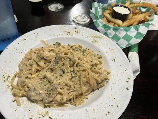 Fettuccine Alfredo with mushrooms (looks better than it tastes) and fries - my pick of the 2!