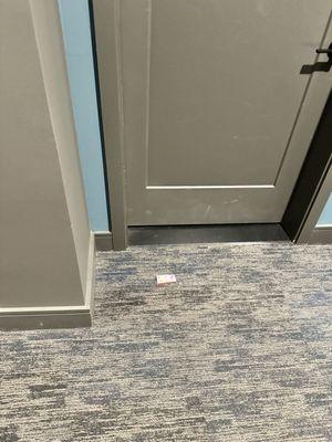 Another business card left on the floor. 
 
 People do not like getting business cards on their door.