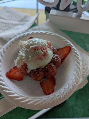 Strawberry mochi donut with strawberry cheesecake ice cream