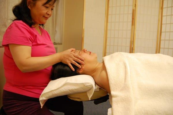 Owner performing therapeutic massage.