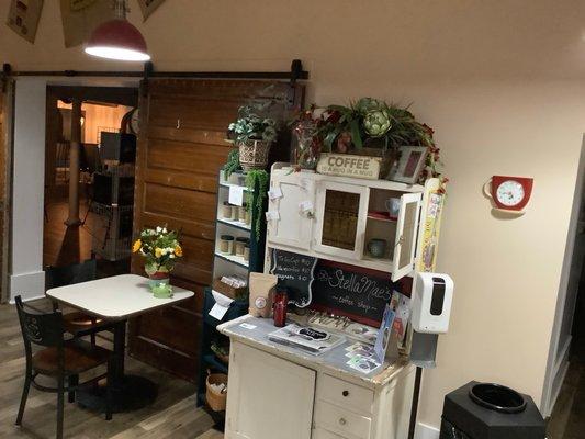 Stella Mae's Hoosier Cabinet holds items for sale