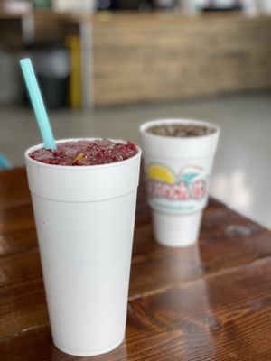 The R&R (water, rasp purée, fresh lemon and lime) with added fresh raspberries, and The Quencher (DP + Coconut)