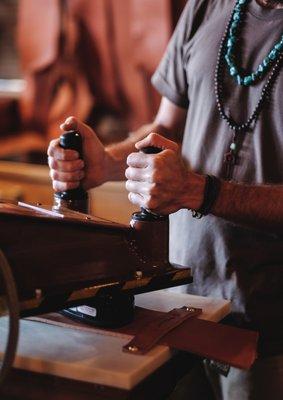 We press & design the sandals in our flagship store on Maui. Our workshops are a great way to see how we do it.