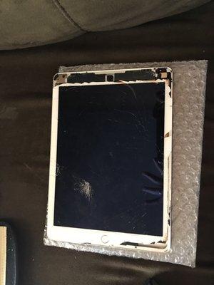 This is how my IPad was returned to me after they tried to fix it....they say a picture is worth a thousand words... so here it is.