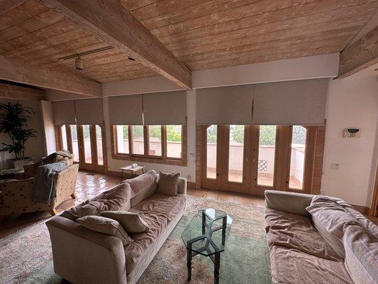 Roller shades under custom built  soffit. Great to hide the window treatment and allow beautiful views