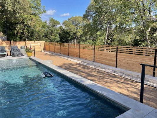 Horizontal cedar fence with metal posts