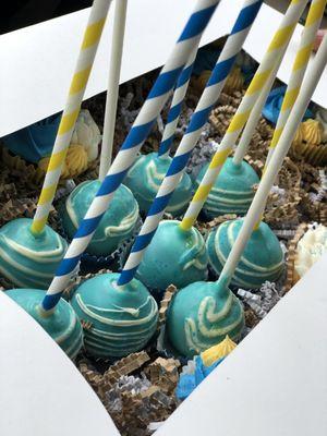 Chocolate with Blue raspberry covered cake pops.