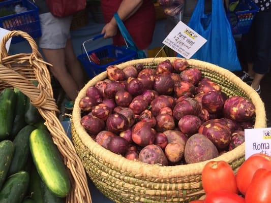 Beautiful pink-fleshed, purple-skinned Viking Purple potatoes.  Organically grown, natch!