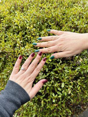 My coffin nails and my daughter's almond nails.