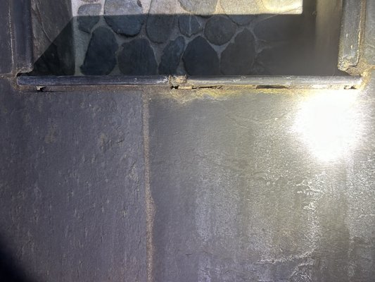 Several holes in grout