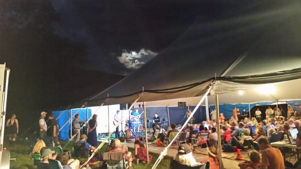 Moon over dance tent.