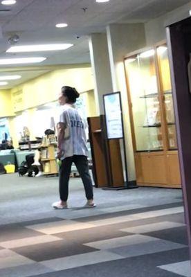 woman walking away, after recording children's area.