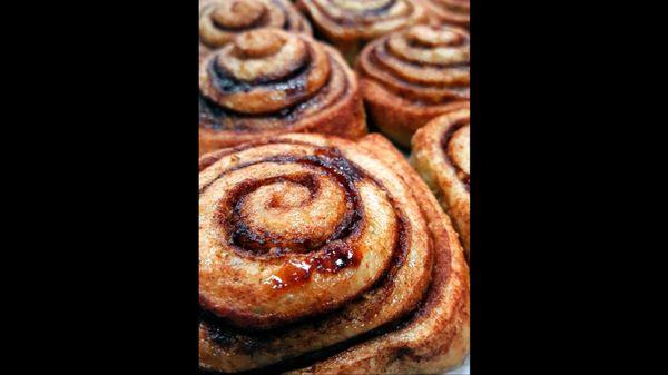 Multigrain cinnamon rolls served with cream cheese frosting. Made with local ingredients!