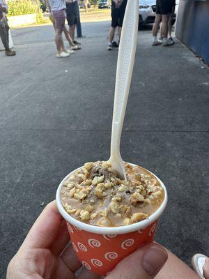 Chocolate soft serve with peanut butter and nuts