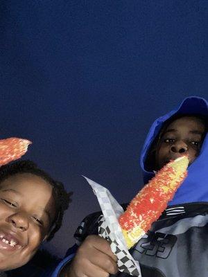 (HEIR VS FSP) Two Kids enjoying they're are corn! At the game ...