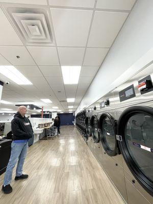 It's nice to see the finished product on this project. We installed Armstrong's 2x2 Ultima Drop Ceiling Grid and Tiles for this Laundromat.