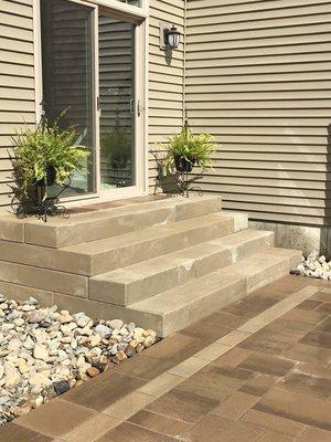 Stairs, landscaping and patio by Elite Property Care